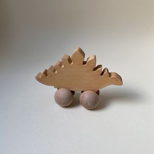 Hölzerner Stegosaurus auf Rädern Konges Slojd